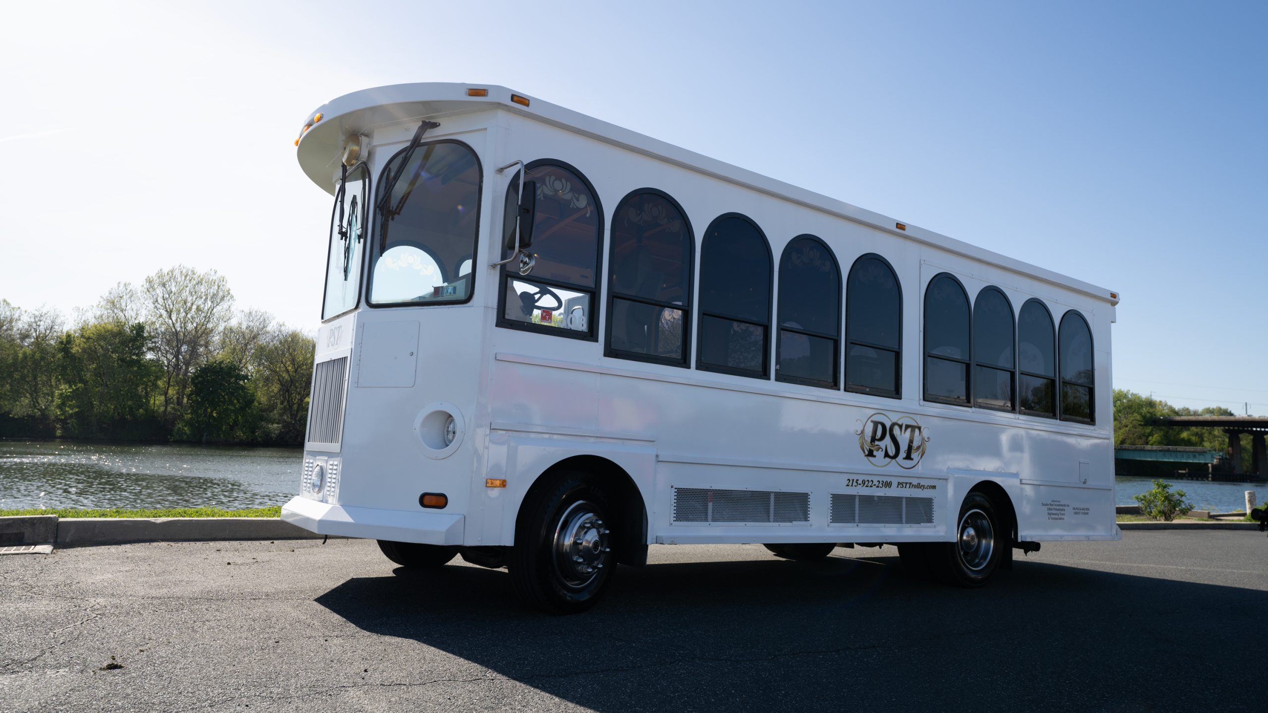 A white bus with black windows, ideal for Bachelorette Parties