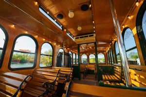 A bus with benches overlooking the water - PST Trolley.